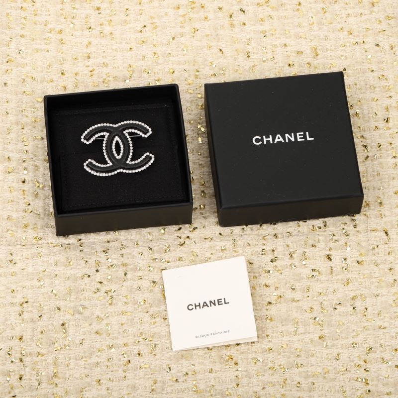 Ch*el brooches